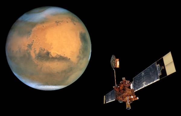 První fotografii družice, která obíhá kolem jiné planety, pořídila v těchto dnech americká sonda Mars Global Surveyor.